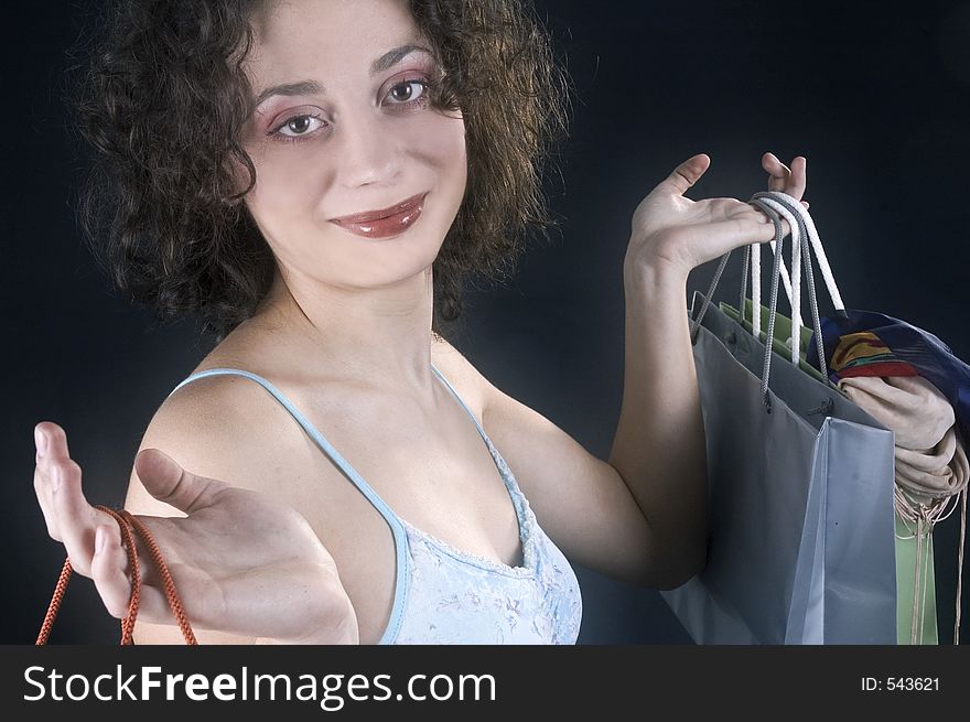 Young woman happy about her shopping. Young woman happy about her shopping.