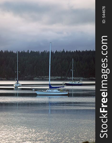 Sailboats in the harbor on a stormy day