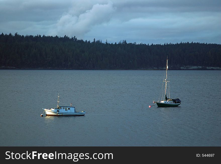 Sailboats in the harbor on a stormy day