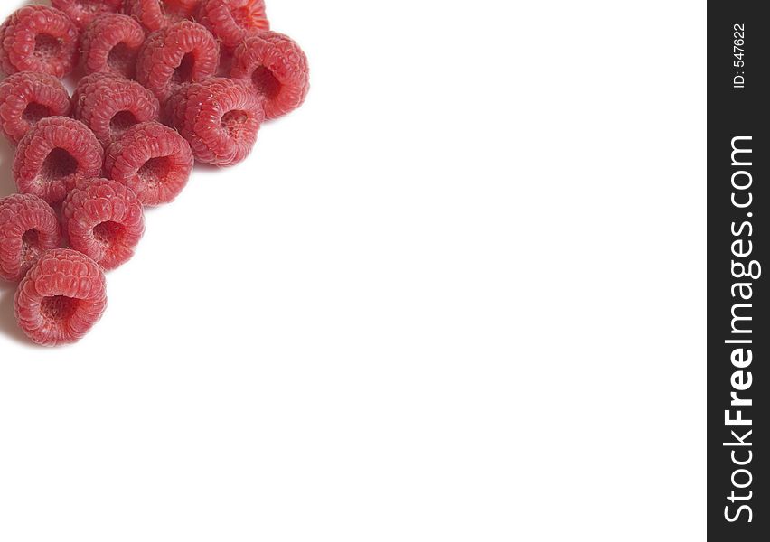 Red raspberries background with room for text