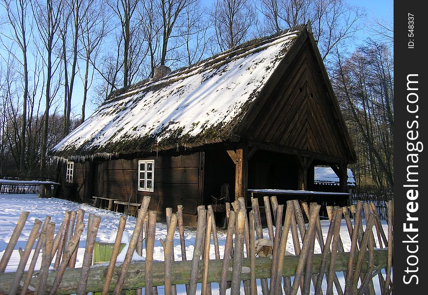 Old wooden hut in wintertime