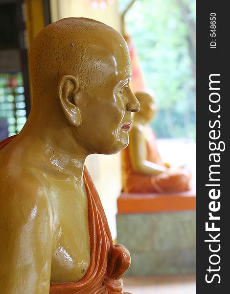 Statue of monks in a temple.