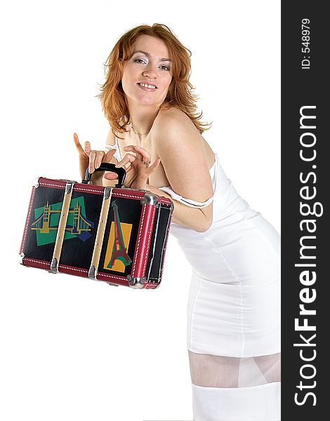 Funny retro portrait of a beautiful woman with old luggage. Funny retro portrait of a beautiful woman with old luggage