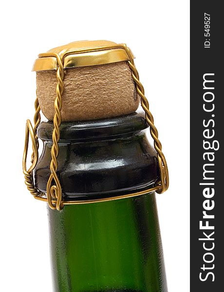 Corked champagne bottle against white. Corked champagne bottle against white.