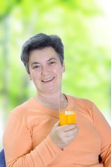 Mature Woman Holding Glass Of Juice Royalty Free Stock Image Mature Woman Holding Glass Of Juice Royalty Free Stock Image
