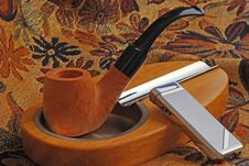 Tobacco Pipe And Wood Ashtray And Lighter Stock Image