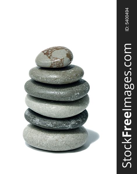 An image of balancing zen soft color stones