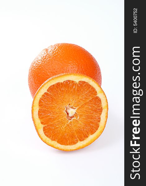 Two fresh oranges isolated on white background