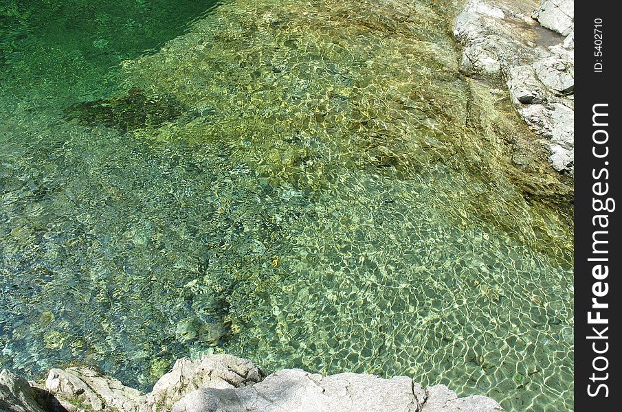 Very clear green river water
