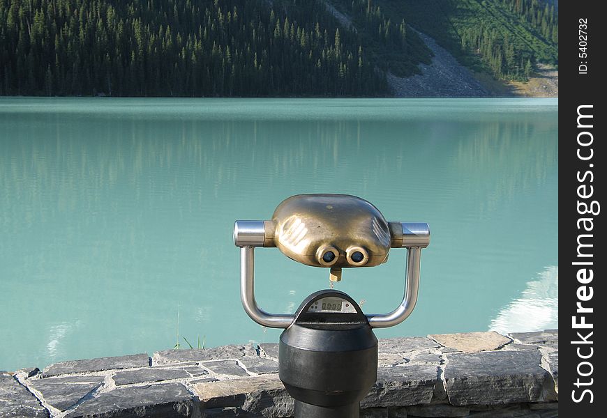 Stand up binocular in front of a lake