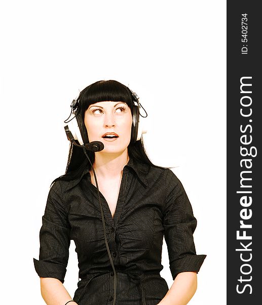 An fit woman in a black dress sitting in an call centre 
for white background and talking to her customer. An fit woman in a black dress sitting in an call centre 
for white background and talking to her customer.