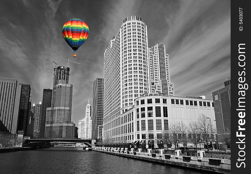 The Chicago Skyline in black and white with colorful hot air balloon.