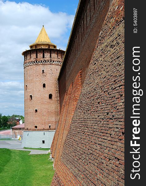 Brick wall and tower of old fortress in Kolomna town near Moscow, Russia (vertical version)