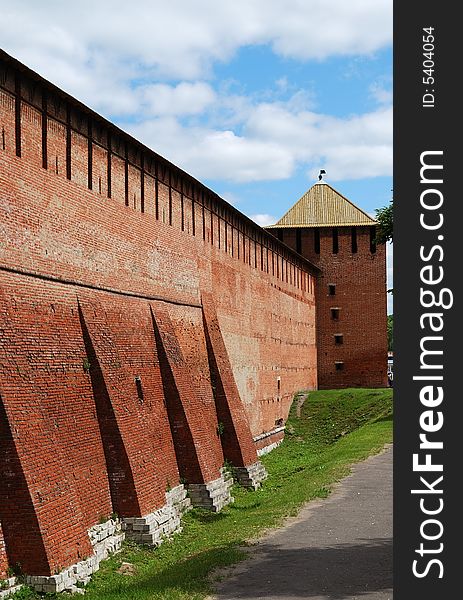 Brick wall and tower of old fortress in Kolomna town near Moscow, Russia (vertical version)