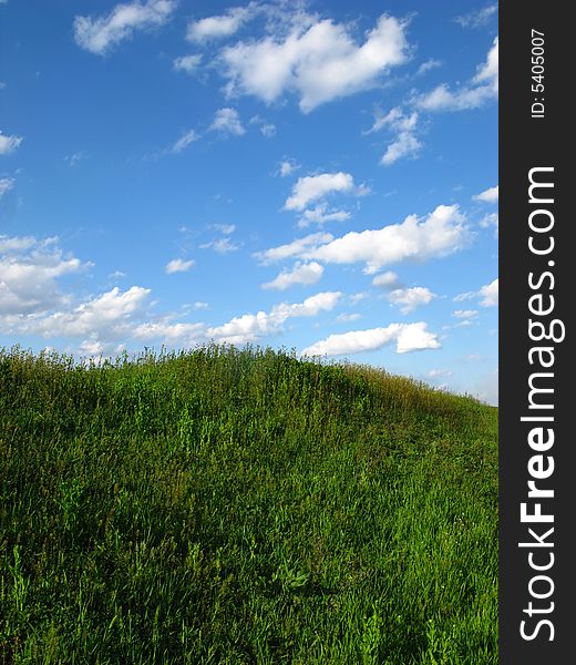 Rural landscape and green field, sky and clouds. Rural landscape and green field, sky and clouds