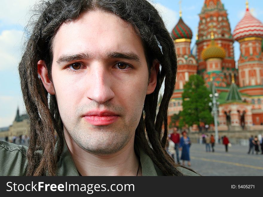 Young man with dreadlock hair.