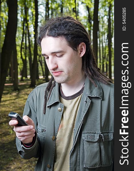 Young man with dreadlock hair.