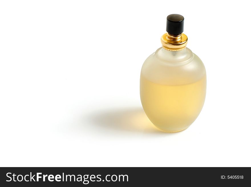 Glass bottle with spirits on a white background. Glass bottle with spirits on a white background