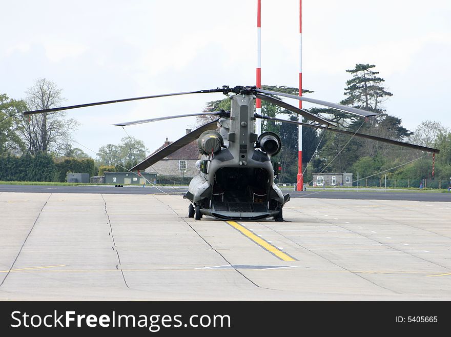 A Boeing Chinook HC2 with its ramp down on the apron. A Boeing Chinook HC2 with its ramp down on the apron