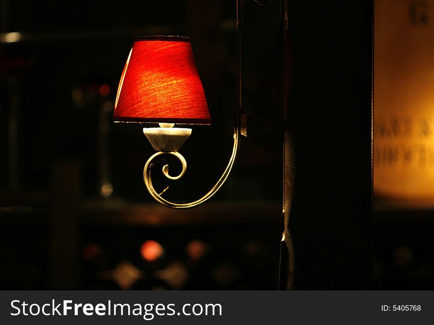 Open wall red  lamp in a restaurant. Open wall red  lamp in a restaurant