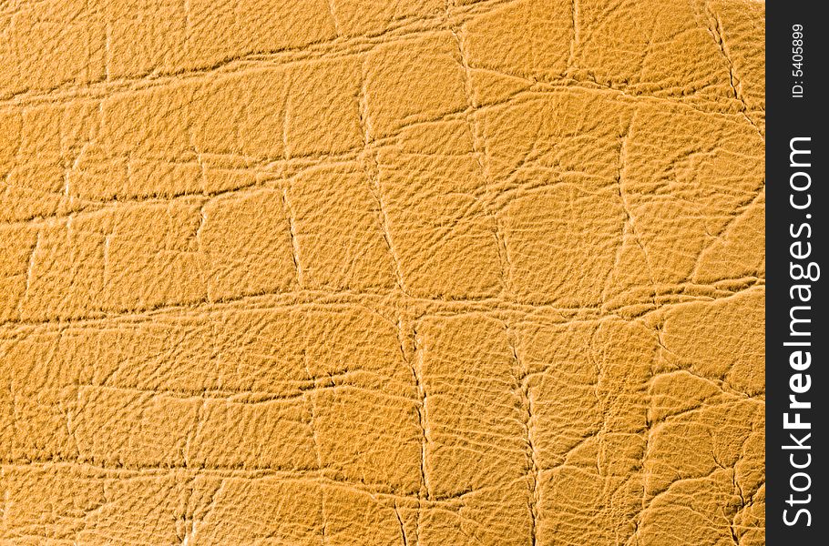 Natural qualitative beige leather texture. Close up. Natural qualitative beige leather texture. Close up.