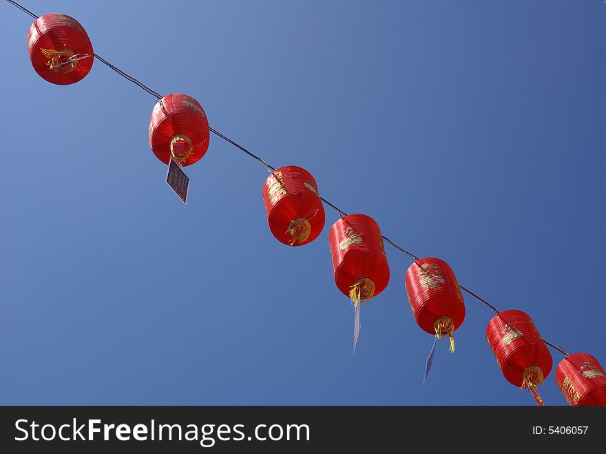 7 red lantern with a blue sky