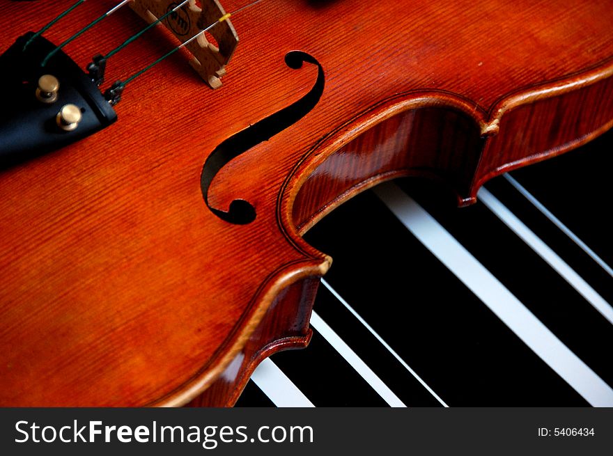 A violin against black backdrop