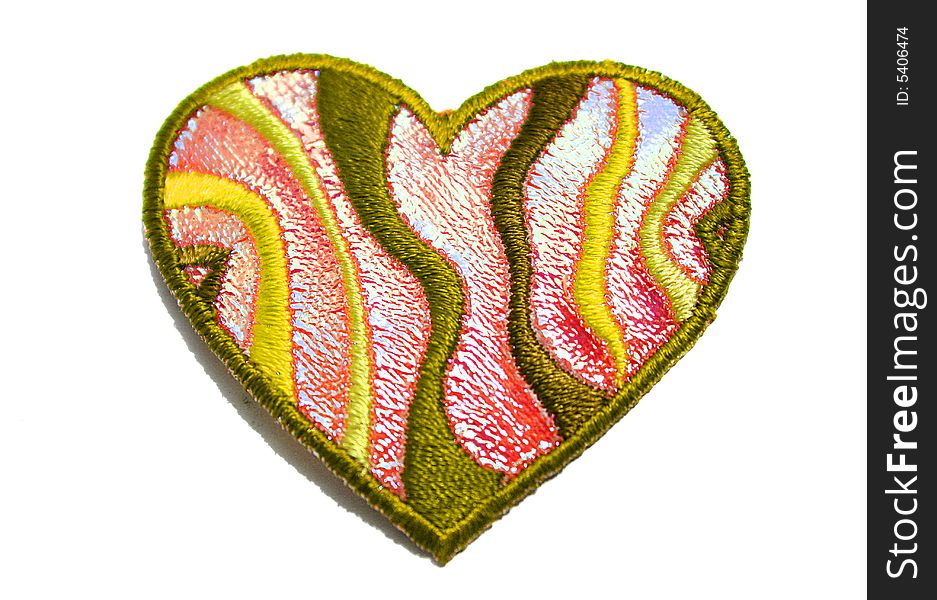 An image of a green funny heart patch. An image of a green funny heart patch