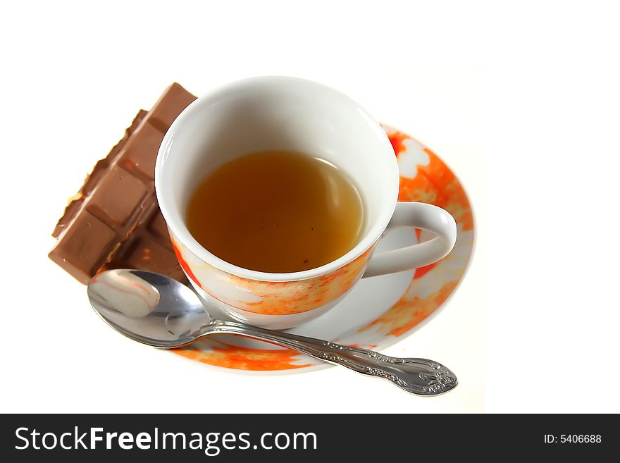 Cup of tea with chocolate on white background