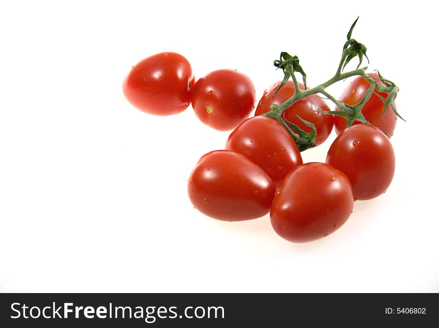 Sweet tomatoes on white background. Sweet tomatoes on white background