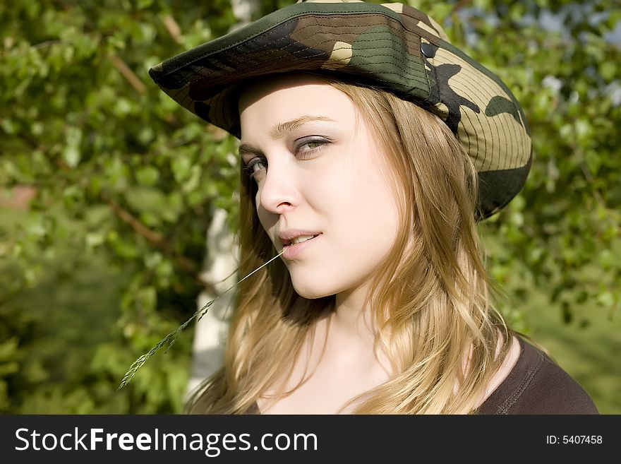 The Woman In A Camouflage Hat. The Woman In A Camouflage Hat