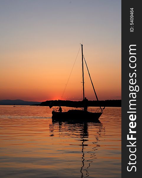 Sailboat silhouette at sunset