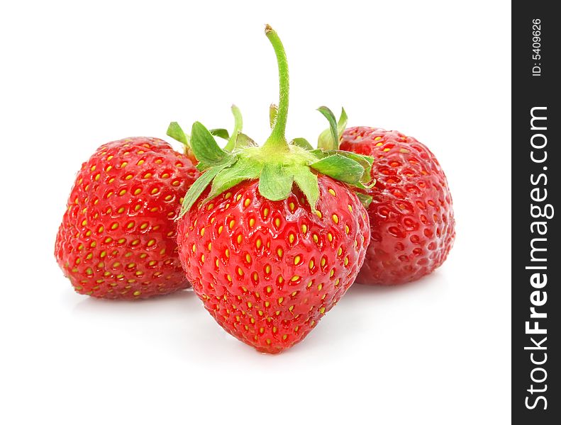 Fruits of red strawberry isolated on white background