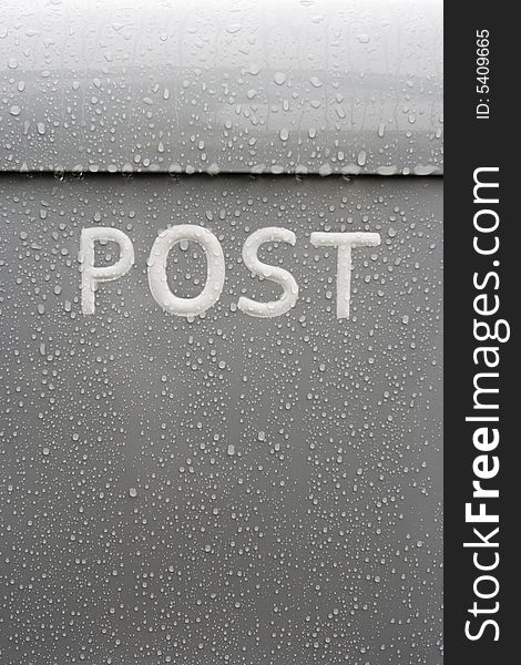 Raindrops falling on the postbox. Raindrops falling on the postbox