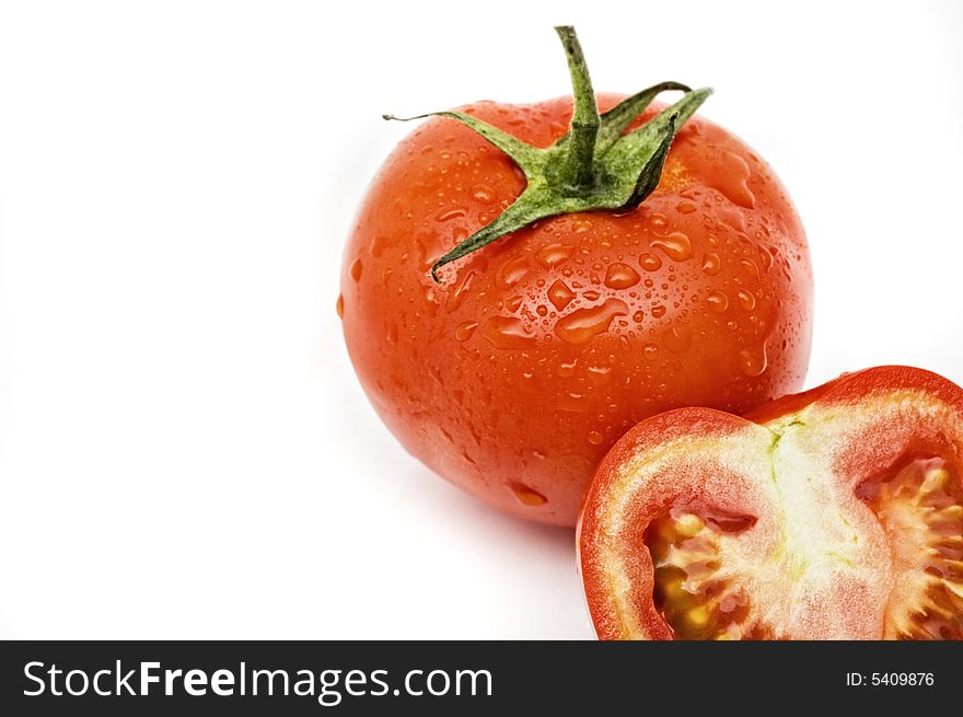 Fresh and juicy tomatoes on white background.