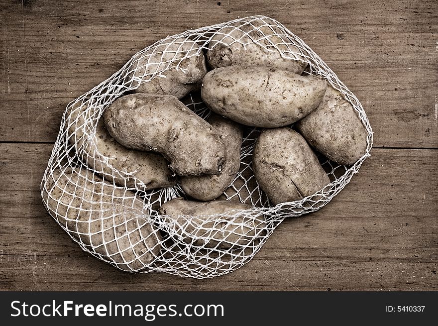 Potatoes On Table.