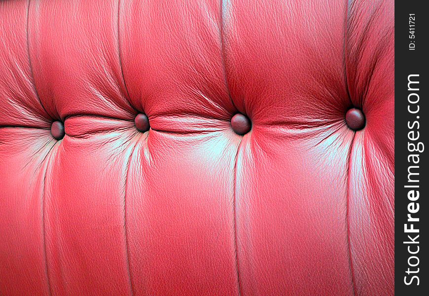 Grunge red leather seat background