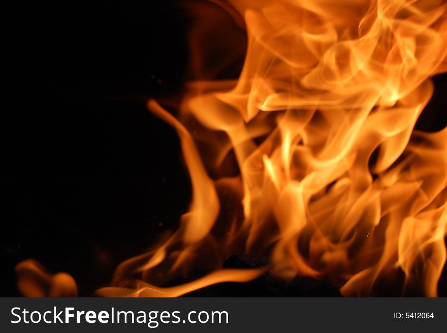 Soft flame swirling to right side of photo frame. Soft flame swirling to right side of photo frame
