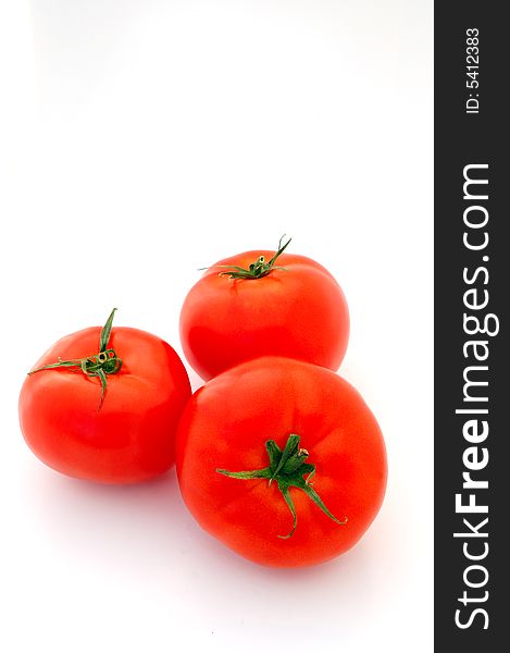 Bright Red Isolated Tomatoes on white background