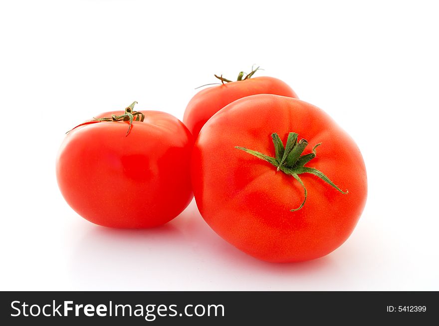 Bright Red Isolated Tomatoes on white background