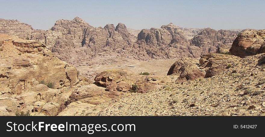 Archaeological site of Petra in Jordan surrounded by beautiful mountains. Archaeological site of Petra in Jordan surrounded by beautiful mountains