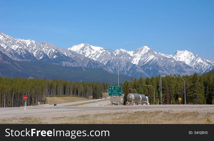 Landscape of spring rocky mountain and highway in kananaskis county, alberta, canada