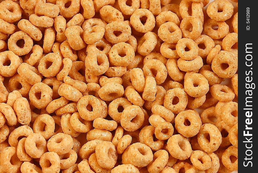 Golden breakfast cereal in circle shapes. Golden breakfast cereal in circle shapes
