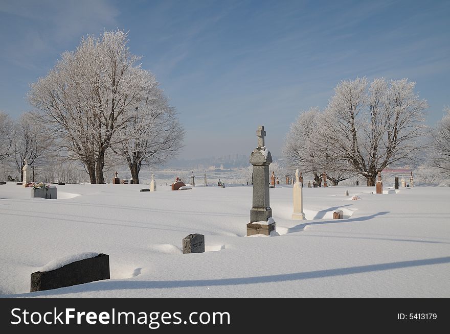 This cemetery lies under a thick white coat of snow. Located in Saint-David, near the Saint-Lawrence River, this site offers a magnificent view . Unfortunately the permanent resident of this place do not really appreciate the view which is surely more interesting for the close relations of the missing who come to pray on their tombs. This cemetery lies under a thick white coat of snow. Located in Saint-David, near the Saint-Lawrence River, this site offers a magnificent view . Unfortunately the permanent resident of this place do not really appreciate the view which is surely more interesting for the close relations of the missing who come to pray on their tombs.