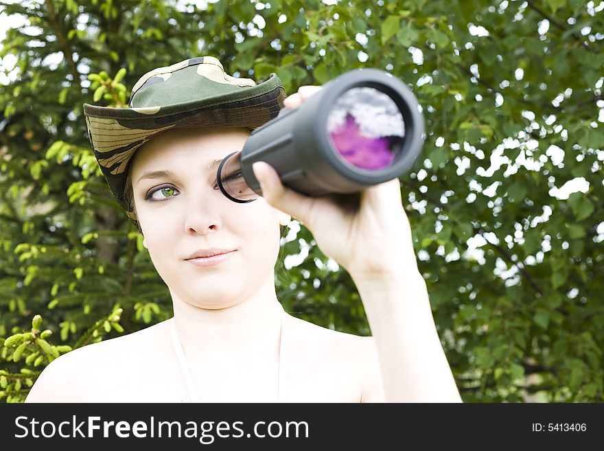 Woman searching with binocular in her hands. Woman searching with binocular in her hands