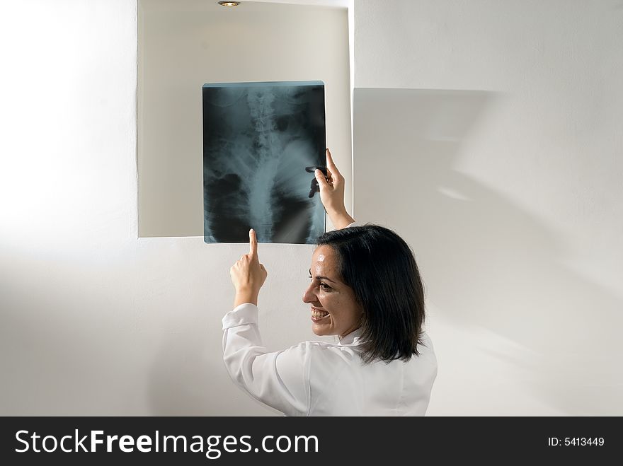 Doctor Points And Laughs At An X-ray-Horizontal