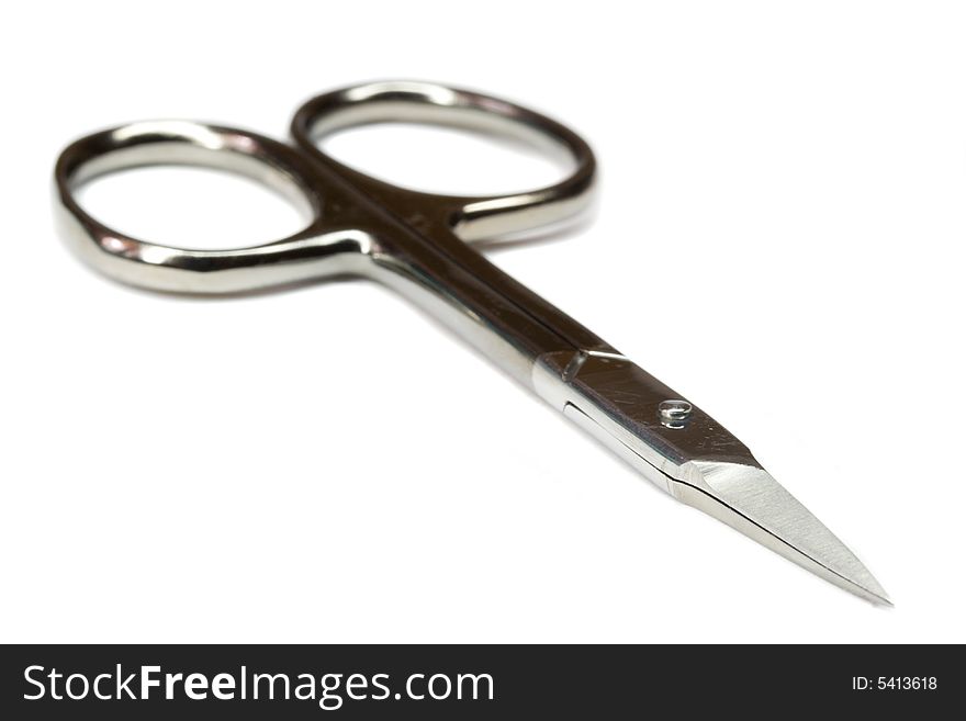 Close-up metal nail scissors, isolated on white. Close-up metal nail scissors, isolated on white