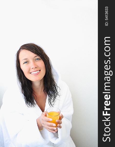 Young smiling woman with orange juice. Young smiling woman with orange juice