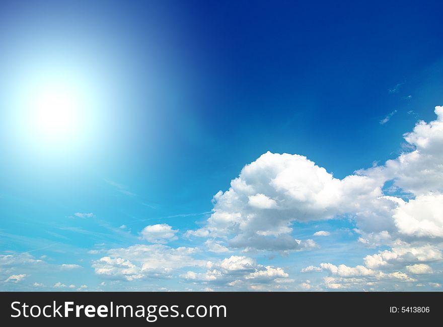 Background with clouds and sun
