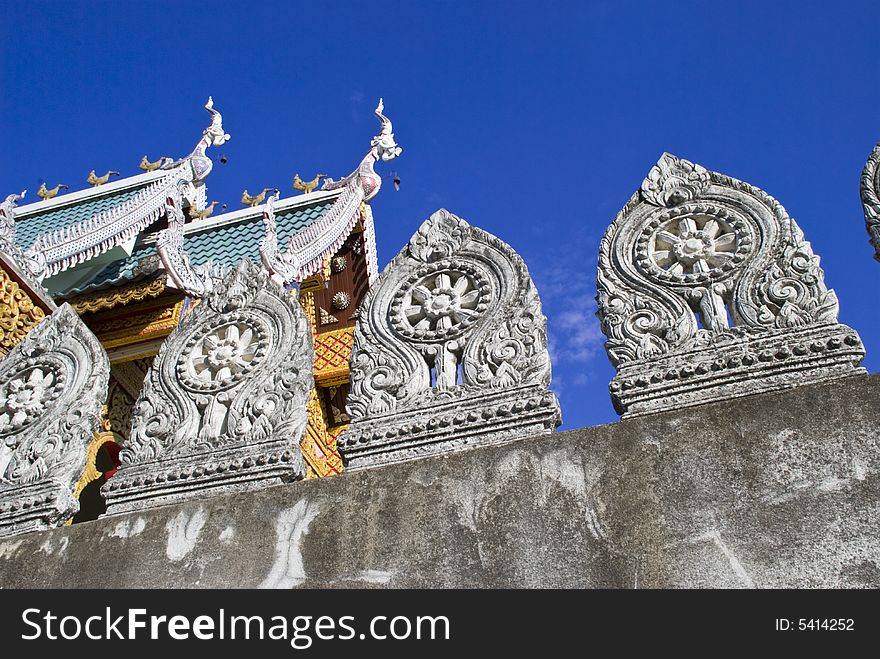 Details of the gate decorations of a temple in Thailand. Details of the gate decorations of a temple in Thailand